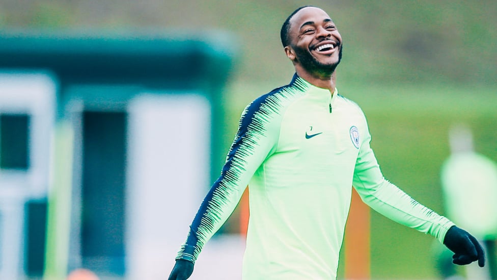 CAUSING A STER : Something's tickled Raheem in training