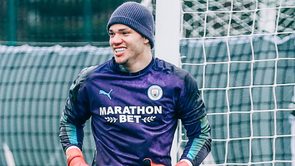 HATS THE WAY TO DO IT: Ederson sports some nifty headwear!