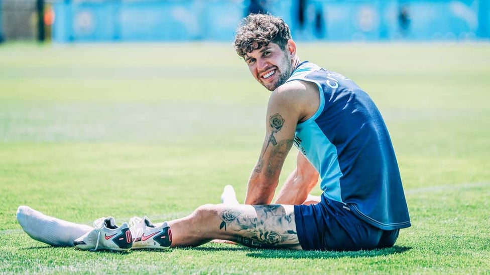 SMILES BETTER: John Stones takes a quick breather during Friday's session