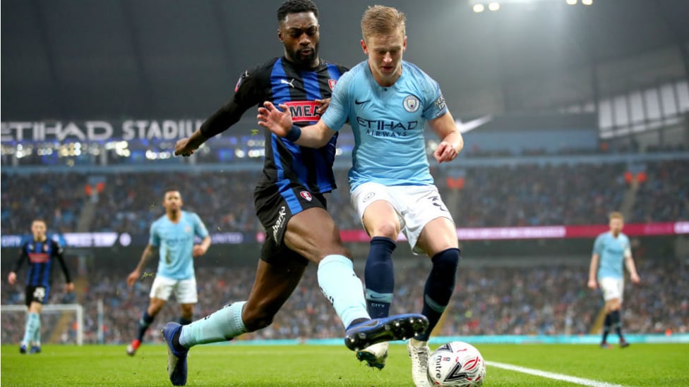 CLOSE QUARTERS : Oleksandr Zinchenko fends off the attention of Rotherham's Semi Ajayi