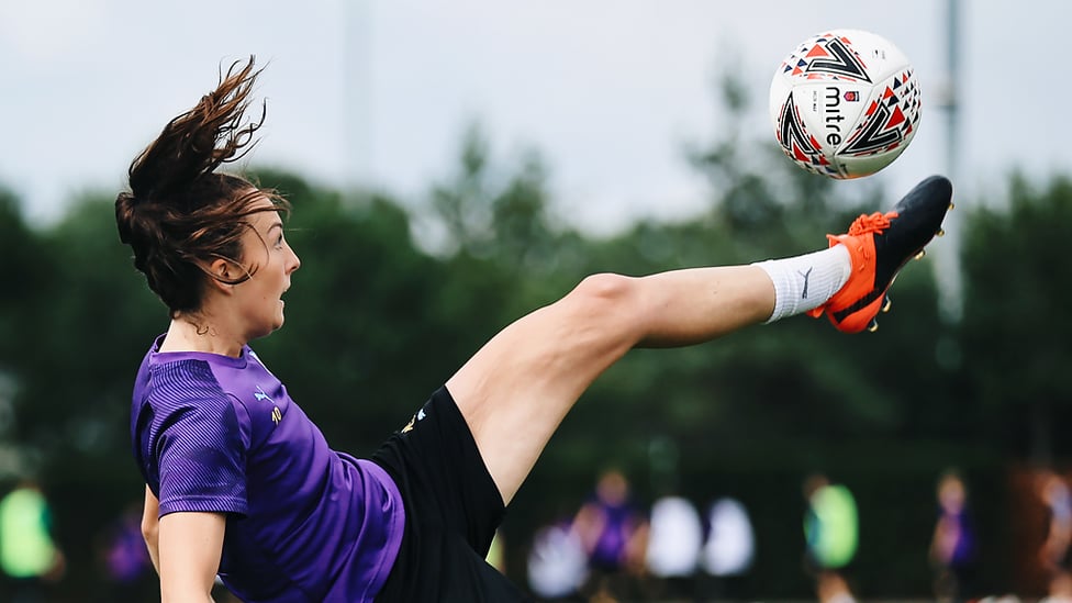 AT FULL STRETCH : Caroline Weir shows her athletic prowess during Monday's training session