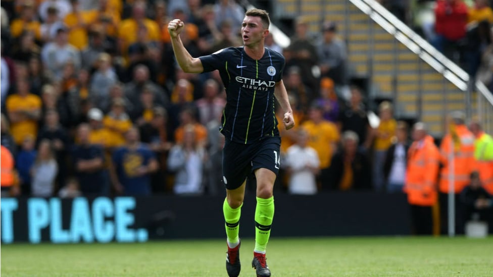 FORWARD MARCH : Laporte salutes the City fans after his thunderous header at Molineux