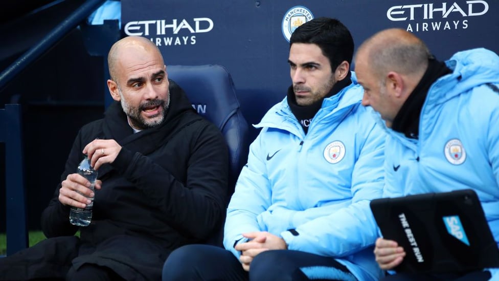 PEP TALK : The boss and his staff watch on from the dugout