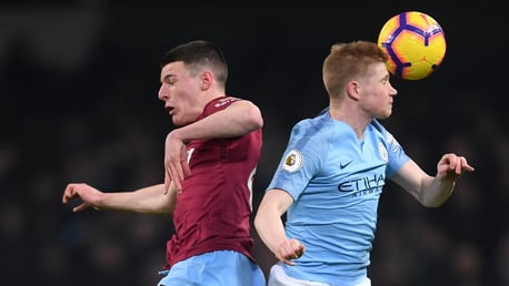 EYES WIDE SHUT: Kevin De Bruyne challenges Declan Rice