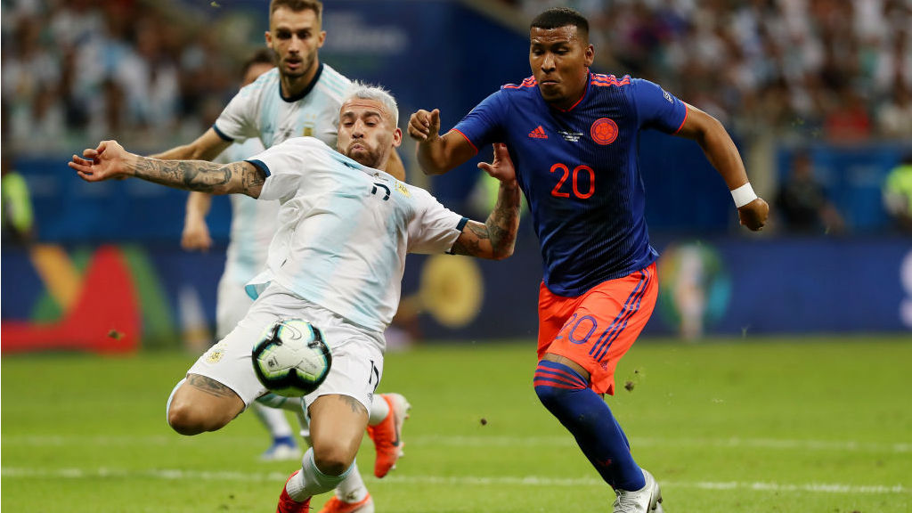 CRUNCH CLASH : Nicolas Otamendi looks to deny Colombia's Roger Martinez