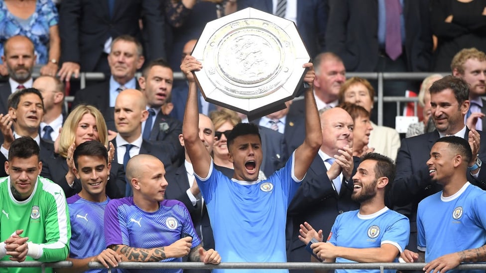 PERFECT START : Rodri lifts his first trophy with City.