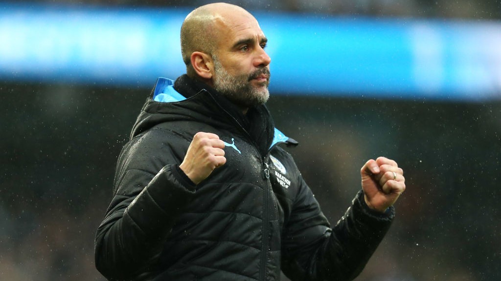 FIST PUMP: Guardiola celebrates City's second goal at the Etihad.