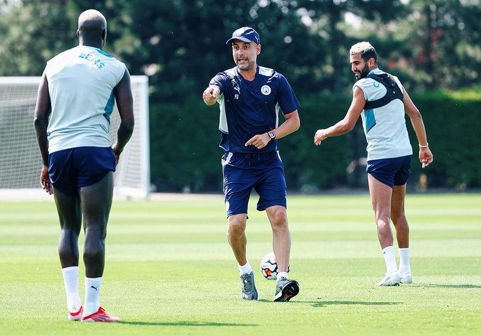 THE BOSS: Pep Guardiola puts the players through their paces