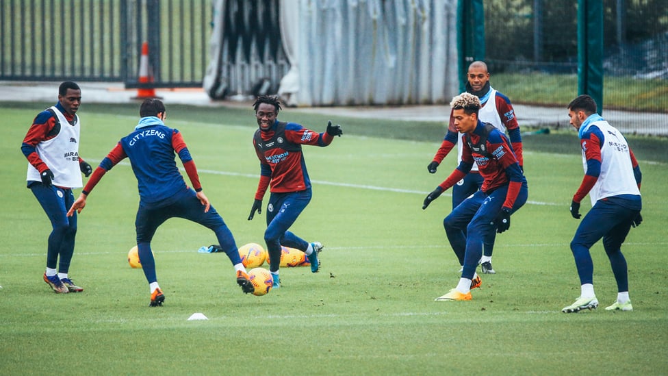 WATCHING BRIEF : Fernandinho keeps an eye on some of the younger members of the training group.