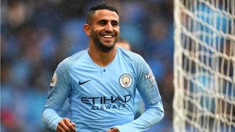 TARGET MAN: Riyad Mahrez is all smiles after scoring his first goal for City in our 5-0 win at Cardiff last month