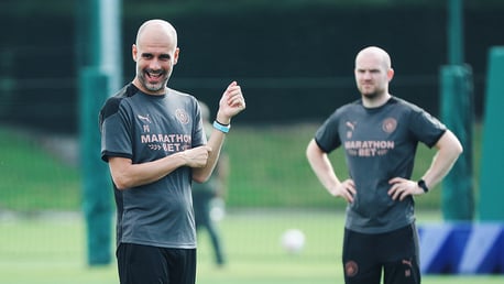 WATCHING BRIEF: Manager Pep Guardiola was in great spirits as he watched over Tuesday's session