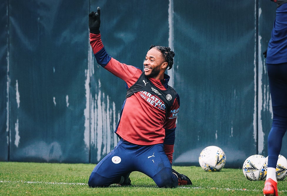 KNEESY DOES IT: There was a spring in Raheem Sterling's step during Monday's session