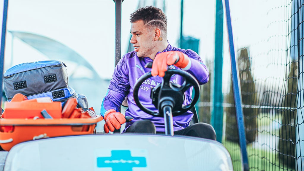 DRIVING FORCE: Ederson swaps the penalty area for the driver's seat.