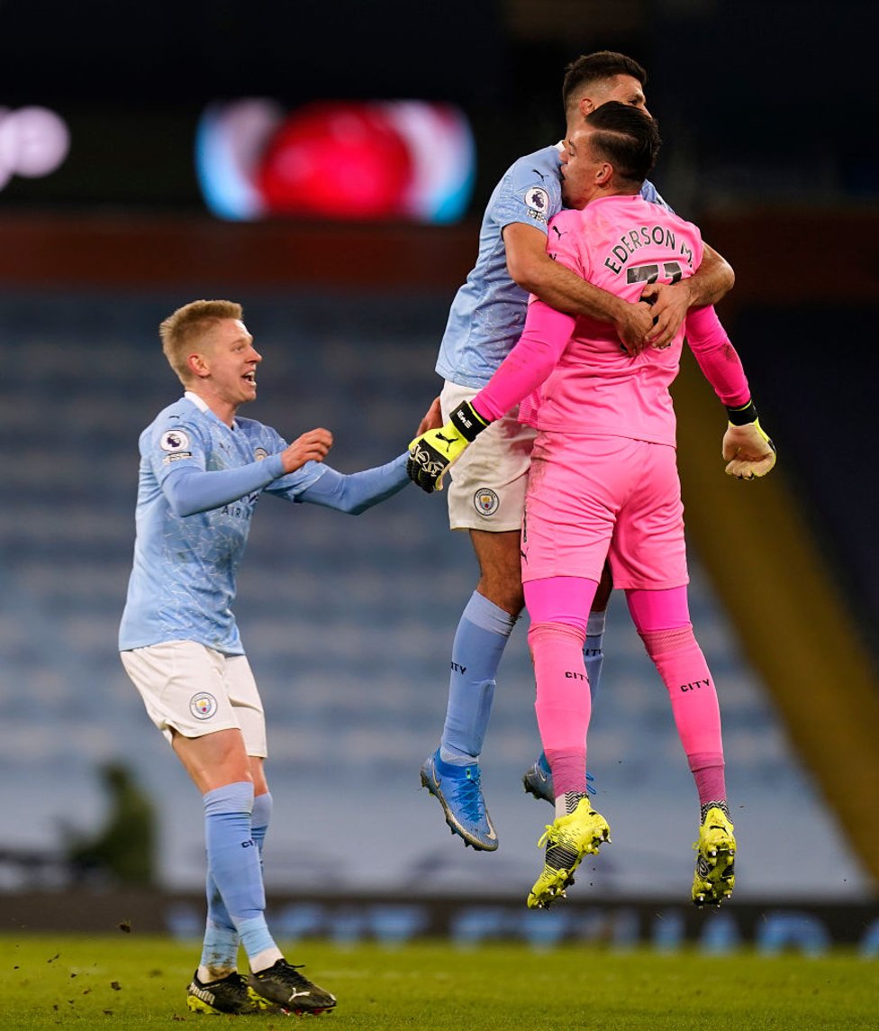 NICE ONE, EDDY : The lads embrace Ederson after his mesmorising assist!