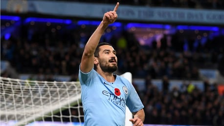 DEMOLITION DERBY: Ilkay Gundogan celebrates after sealing victory for City