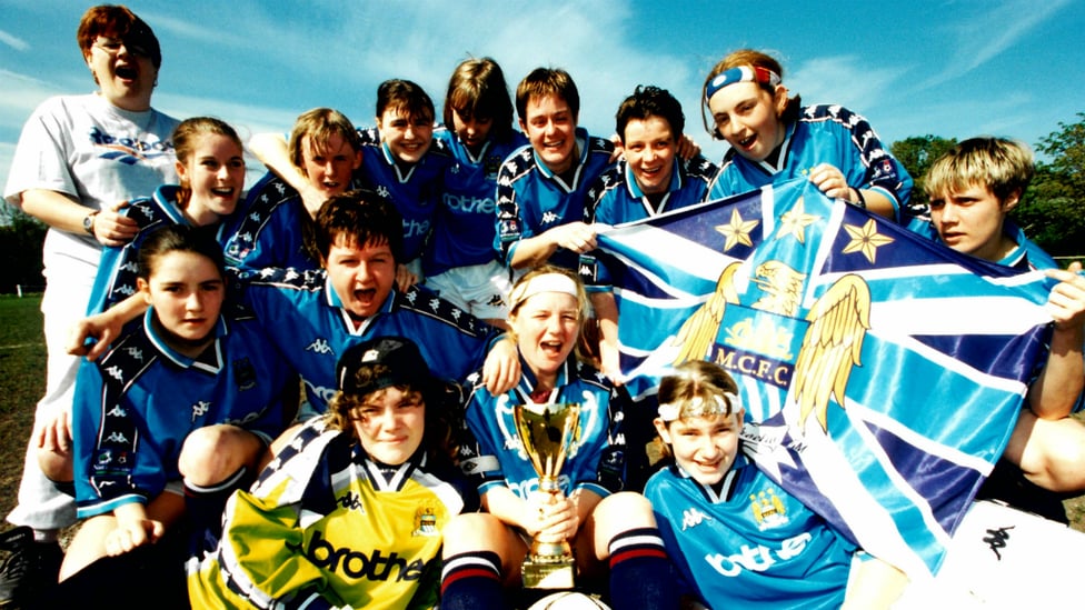 BUZZING BLUE : Celebrating trophy success in the late 90s