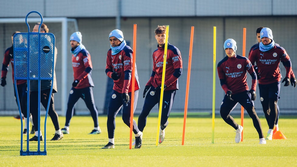 SQUAD GOALS: The City players limber up with some fitness exercises