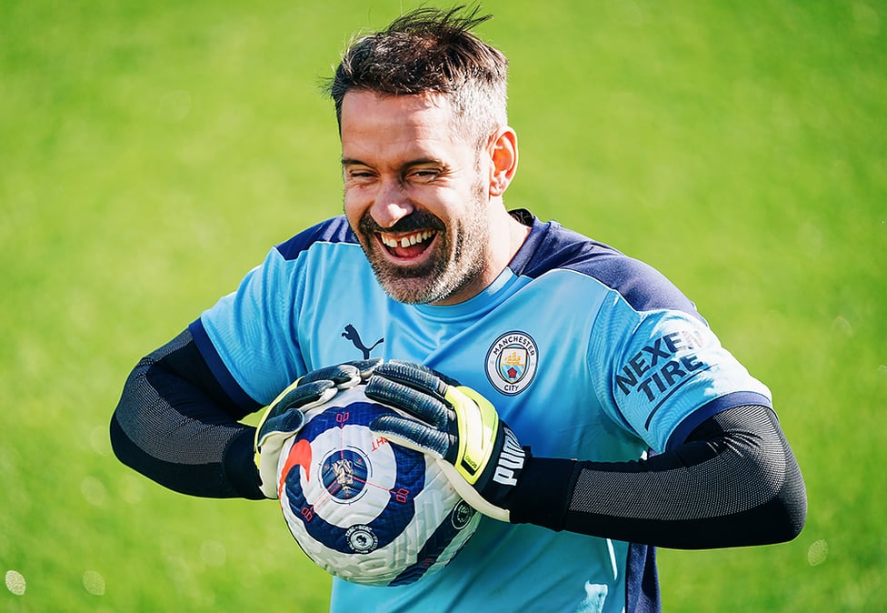 GLOVE STORY: Something has obviously given Scott Carson reason to be cheerful!