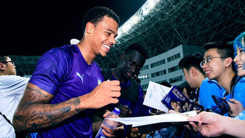 SIGN HERE : Lukas Nmecha is happy to oblige for some autograph hunters