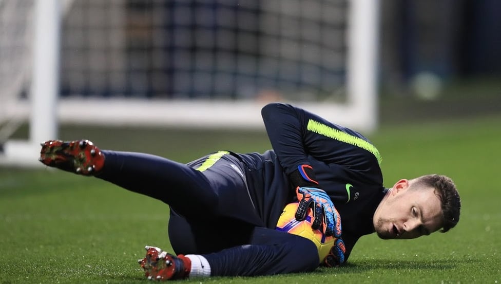 DOWN LOW : Cold work for keepers on a freezing Manchester evening