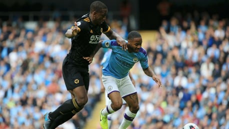 TRICKY CUSTOMER: Sterling holds off Boly in a tense first half. 