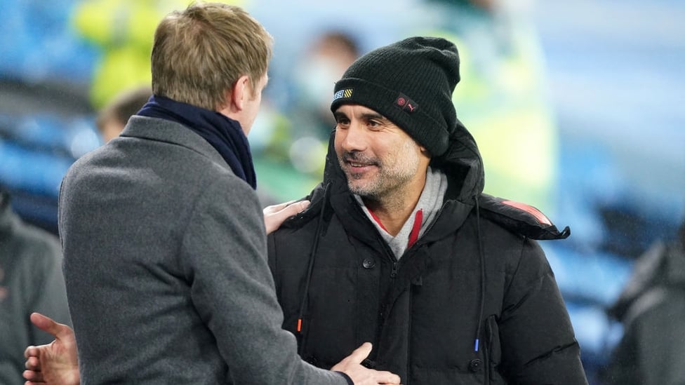 BOSSES : Guardiola and Potter share a warm moment at the Etihad.