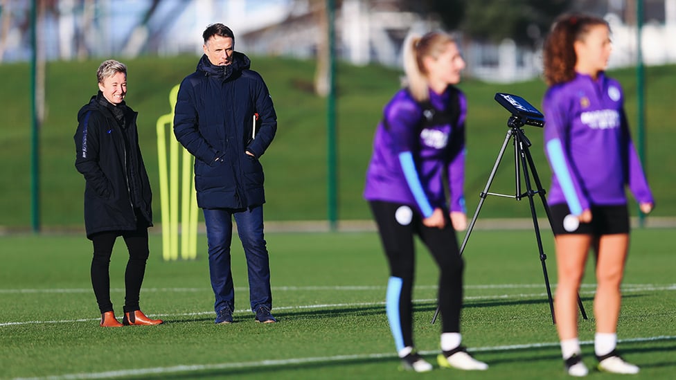 INTERNATIONAL ATTENTION : England boss Phil Neville and assistant Bev Priestman watch on from the sidelines