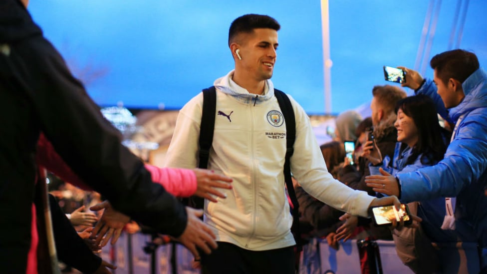 CAN-SMILE-O : Our full-back is all smiles as he arrives at the Etihad.