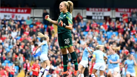JUMPING FOR JOY: Goalkeeper Ellie Roebuck joins in the celebrations after Caroline Weir's goal