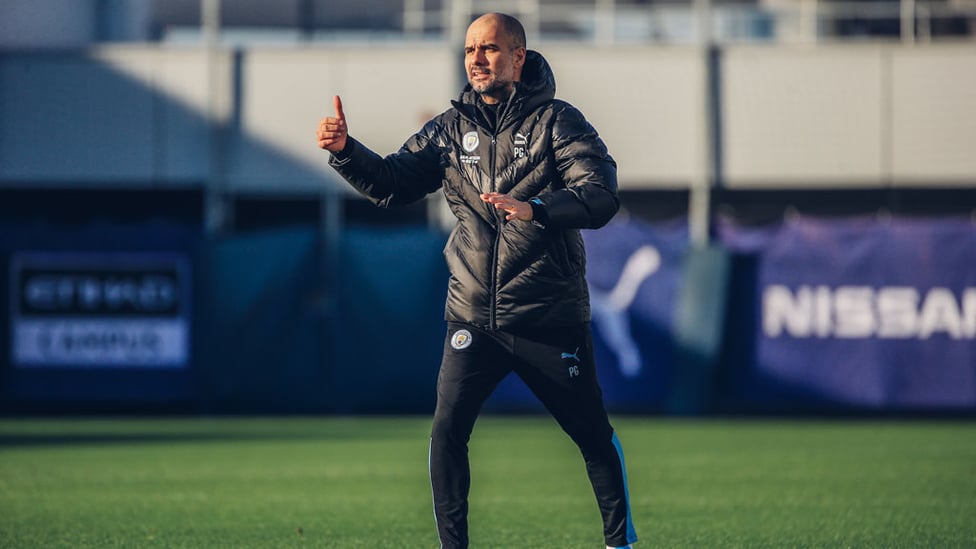 THE BOSS : Guardiola shouts out instructions on the training turf at the CFA.