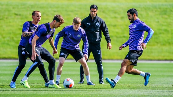 ROCK SOLID STONES: The England defender shields the ball during training