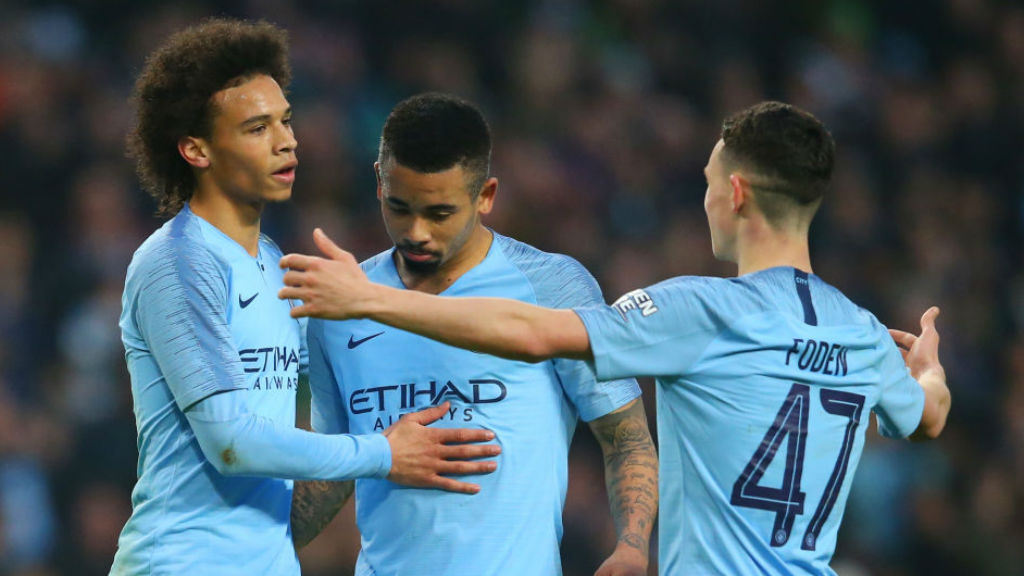 SEVEN UP: Leroy Sane is congratulated after his late strike