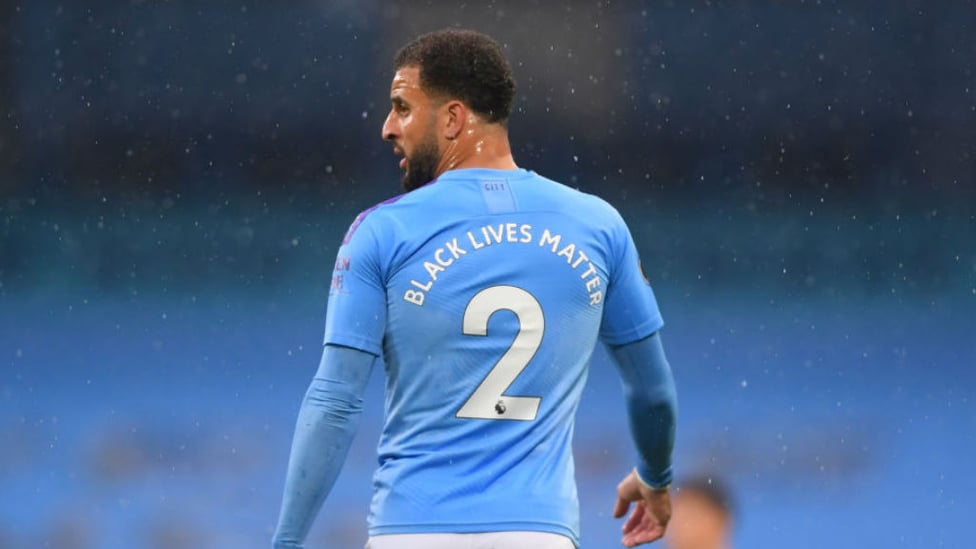 SPELLING IT OUT: The back of Kyle Walker and his City colleagues' shirts was also emblazoned with the message Black Lives Matter