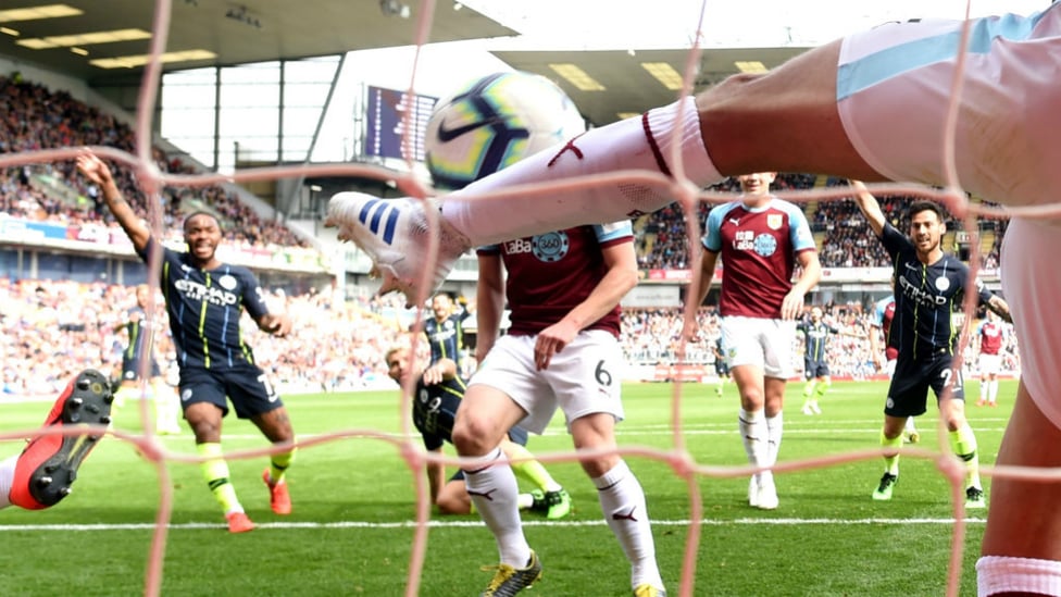 MILLIMETRES : Matthew Lowton was SO CLOSE to denying Sergio's winning goal.