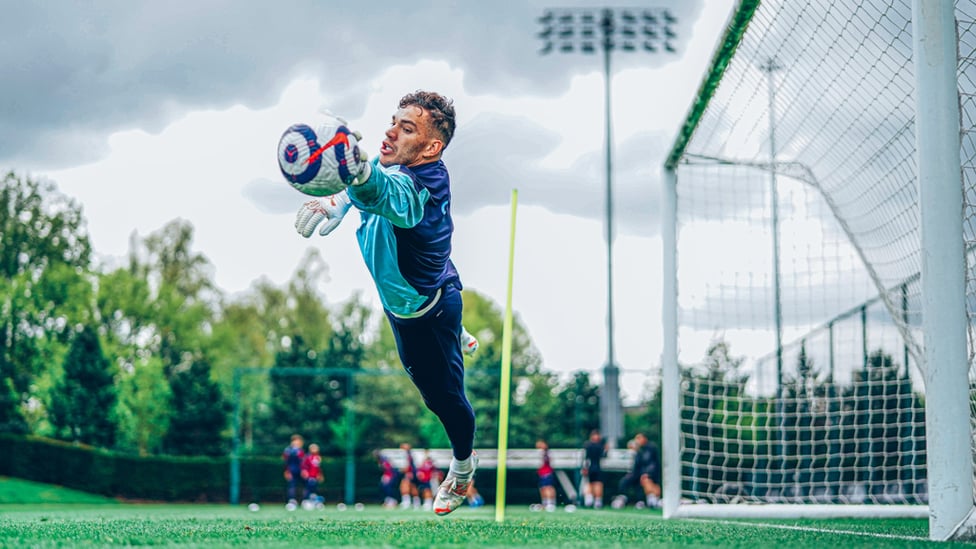 SWEEPER KEEPER : Ederson looks to make a great save to his left!