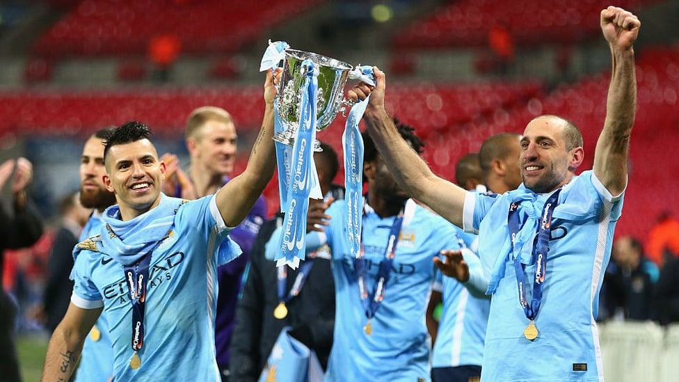CAPITAL GAINS : Kun and Pablo Zabaleta lift the League Cup trophy aloft after our 2016 Capital One Cup final win over Liverpool