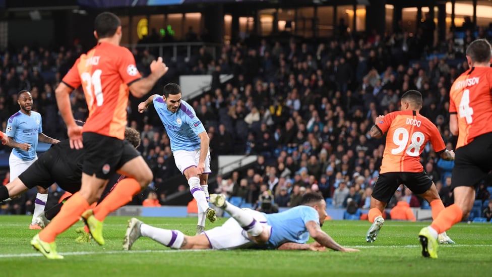 DEADLOCK BROKEN : Ilkay Gundogan opens the scoring, finishing off a well-worked team move