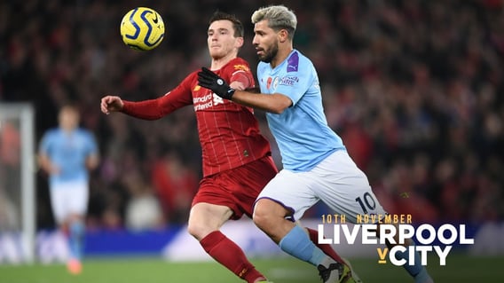 MATCH ACTION: Sergio Aguero competes with Andy Robertson at Anfield.