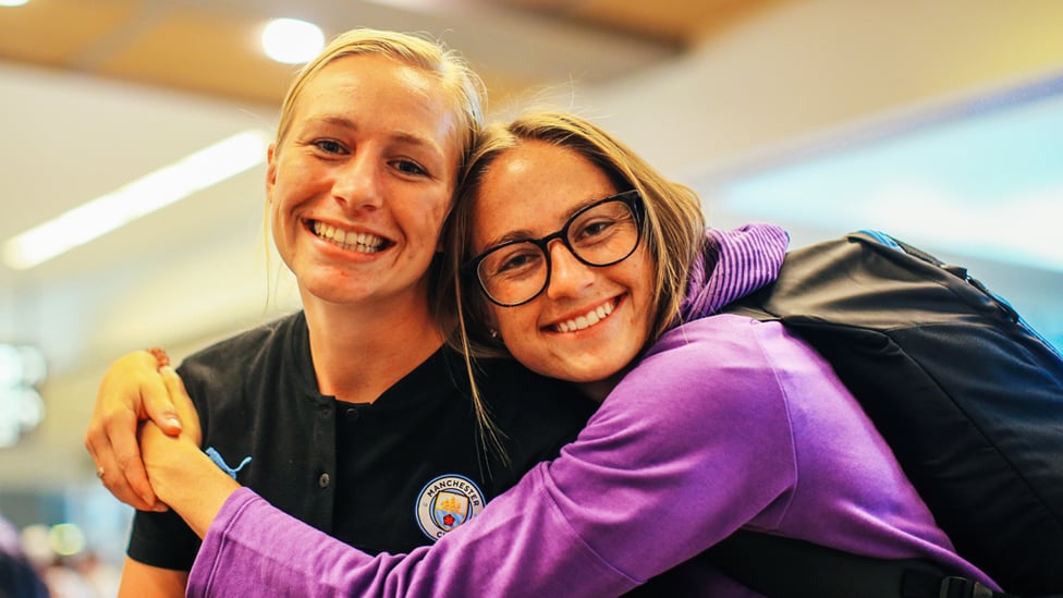 HUG IT OUT : Janine Beckie grabs Pauline Bremer for a snap!