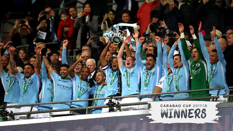 CHAMPIONS: Vincent Kompany lifts the Carabao Cup for the third time as City captain