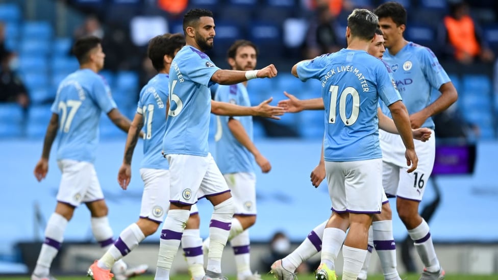 CELEBRATE : Mahrez celebrates with Aguero after doubling our lead in fine fashion.