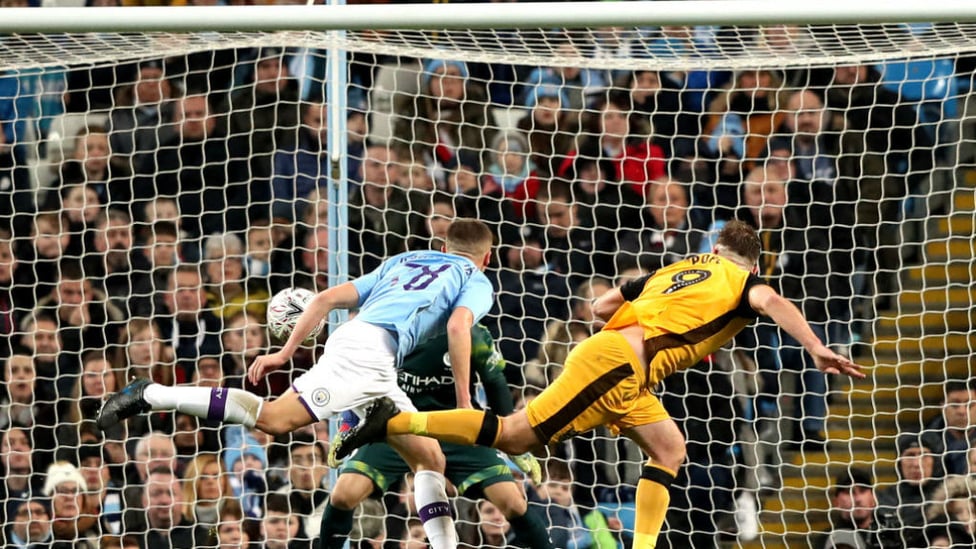 LEVEL PEGGING : Tom Pope heads home to equalise for Port Vale