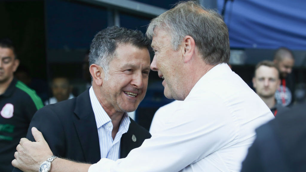 BLUE REUNION : Age Hareide greets Paraguay boss Juan Carlos Osorio, who spent five years in City's backroom staff