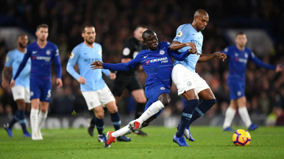 MY BALL : Fernandinho shows his strength to hold off Kante