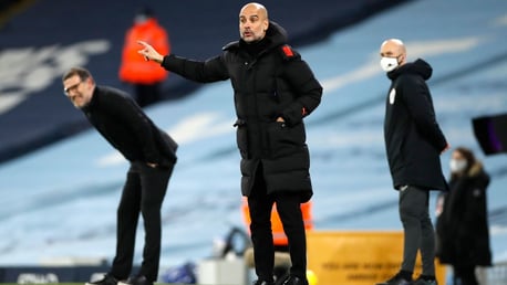 THE BOSS: Guardiola passes on his instructions.