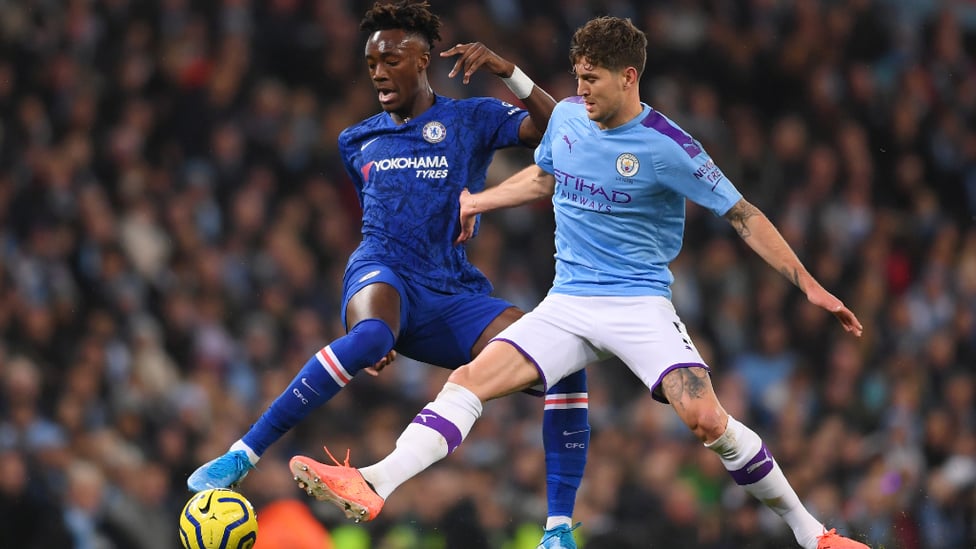 DUEL : John Stones looks to dispossess Tammy Abraham