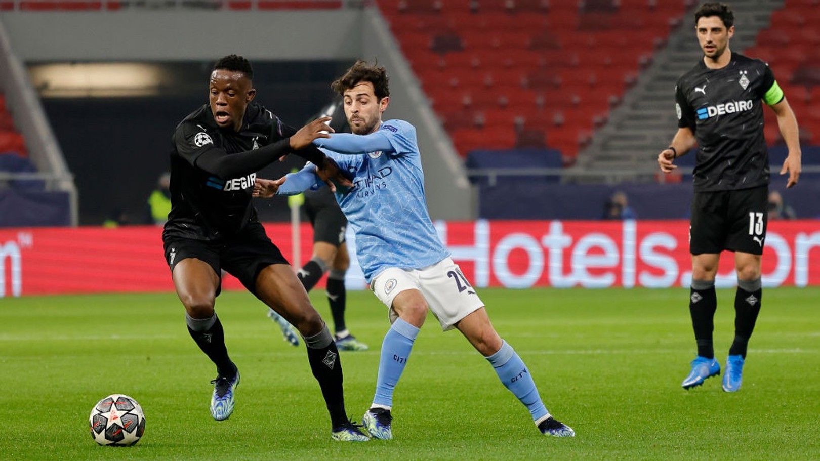 Manchester City's Joao Cancelo heads the ball during the Champions