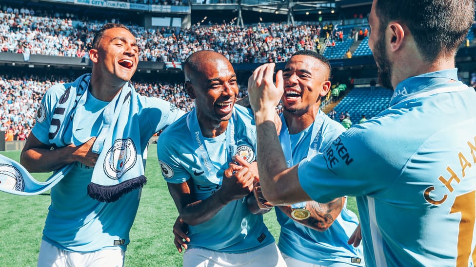 SUNSHINE BOYS : Fernandinho shares in the 2018 title joy with Danilo, Gabriel Jesus and Bernardo Silva