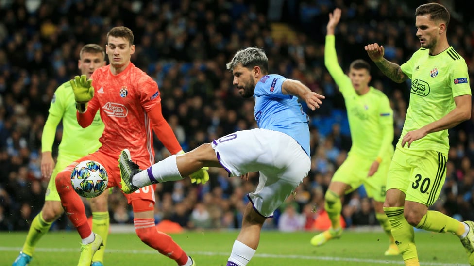 ON THE ATTACK : Aguero attempts to open the scoring from a tight angle in the first half