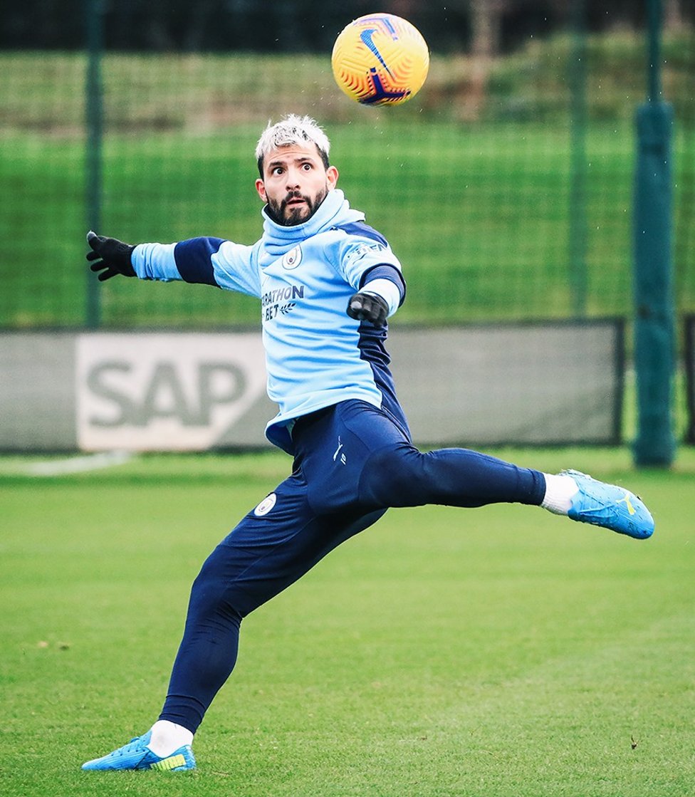 EYES ON THE PRIZE : Sergio Aguero eyes up a volley - We know where that one is heading!